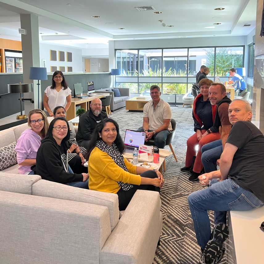 Matterpeeps gathered around a lobby with couches